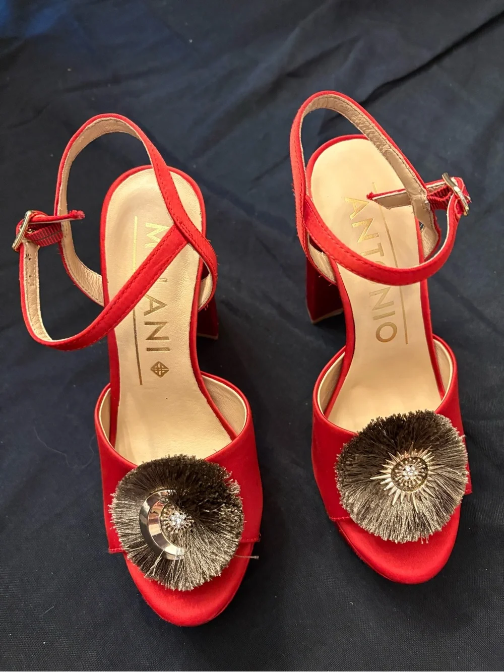 ANTONIO MELANI bold red